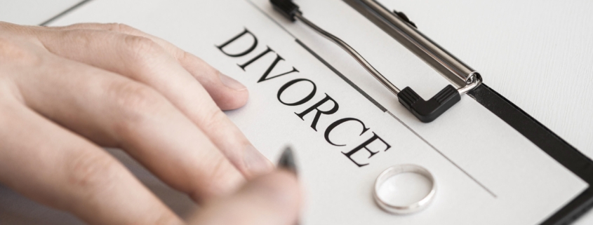 close-up-male-signing-divorce-contract divorce