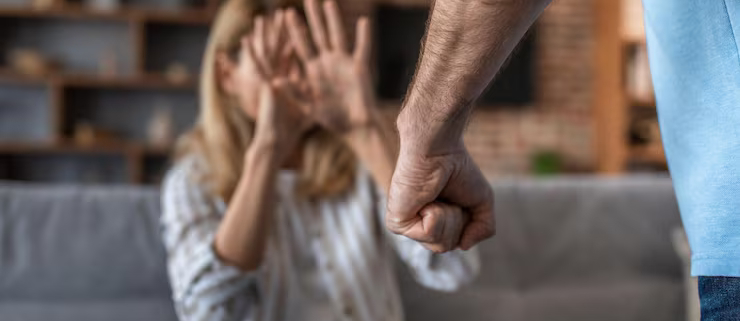 sad-crying-adult-caucasian-wife-covers-her-face-afraid-her-aggressive-husband-living-room-interior_116547-30380 domestic Violence